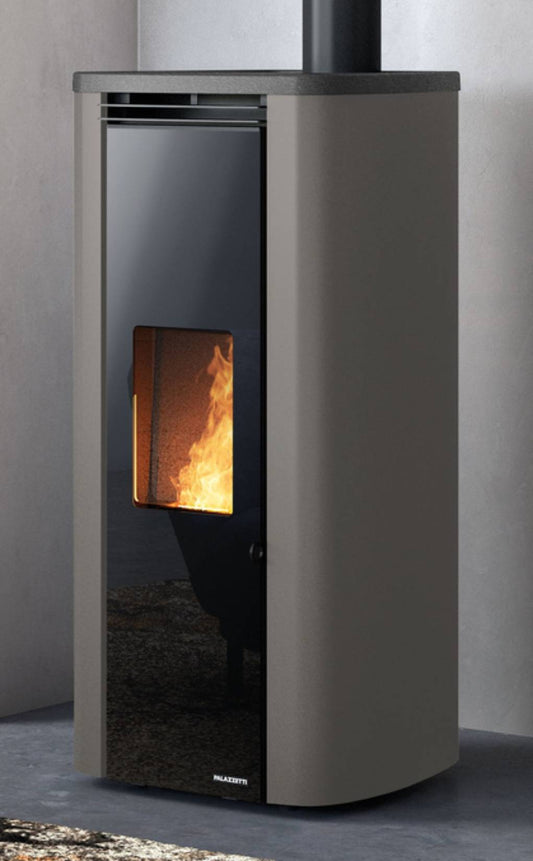 Palazzetti Theo TC 9 US Stufa a Pellet Ermetica Aria Calda Ventilata Canalizzabile Potenza 9 Kw Rivestimento Acciaio Colore Tortora Forma Circolare Uscita Fumi Superiore Doppio Vetro Combustione Totale Pulizia Automatica Braciere Cassetto 52x54 H110 cm