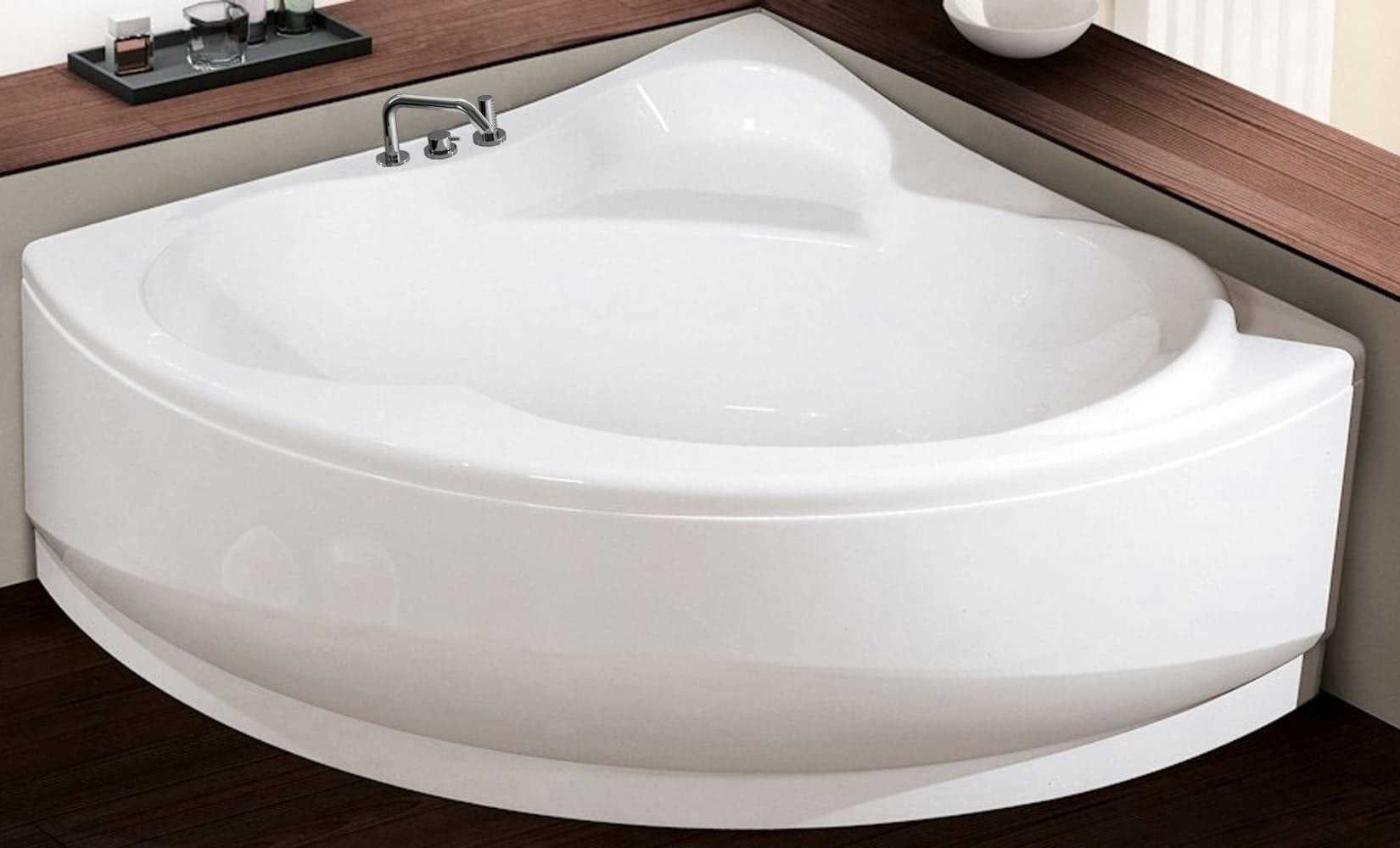 Novellini Una Vasca da Bagno Versione Standard Con Telaio Misura 135x135 H55 cm Forma Esterna Tonda Curva Semicircolare Simmetrica Interna Ovale Installazione Angolare Reversibile Pannello Frontale Colonna Rubinetto Materiale Acrilico Colore Bianco Lucido