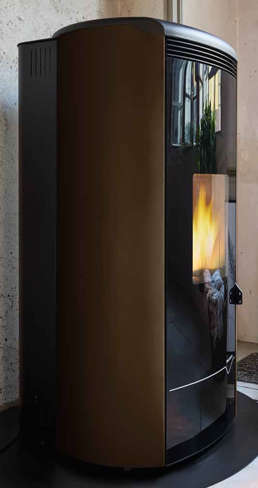 Palazzetti Jackie Idro S26 TC ACS Termo Stufa Pellet Ermetica Aria Ventilata Acqua Calda Sanitaria Potenza 26 Kw Rivestimento Acciaio Moka Top Ghisa Uscita Fumi Posteriore Controllo Sfioro Programma Fasce Orarie Gruppo Idraulico Integrato Autopulizia
