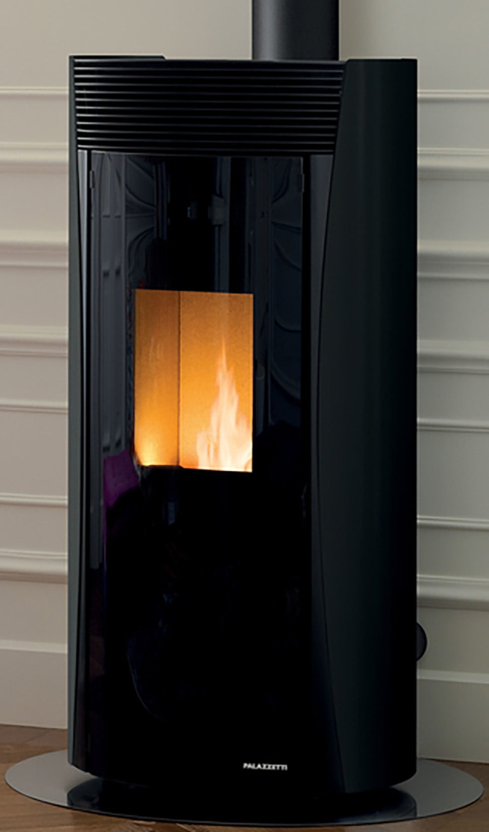 Palazzetti Vivienne TC 9 Us Pro 2 Stufa Pellet Ermetica Aria Ventilata Canalizzata Regolabile Potenza 9,3 Kw 2 Ventilatori Indipendenti Acciaio Nero Forma Circolare Uscita Fumi Superiore Porta Doppio Vetro Combustione Totale Auto Pulizia Braciere Cassetto